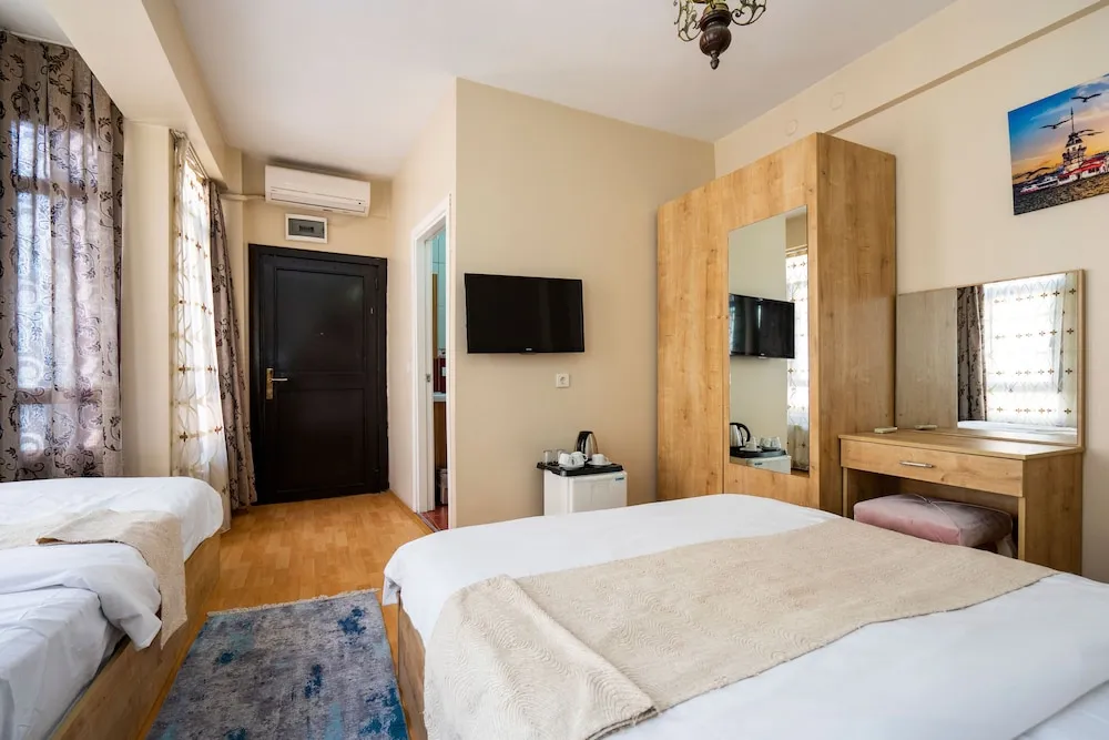 Deluxe Üç Kişilik Oda
