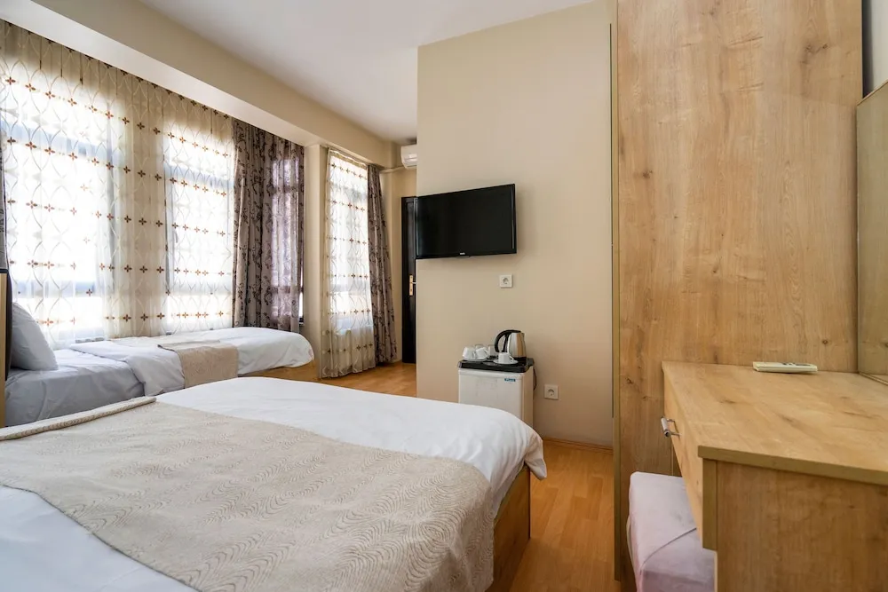 Deluxe Üç Kişilik Oda
