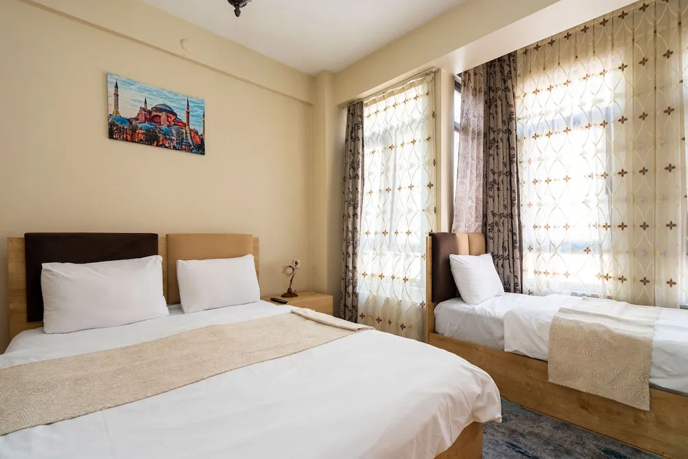 Deluxe Üç Kişilik Oda