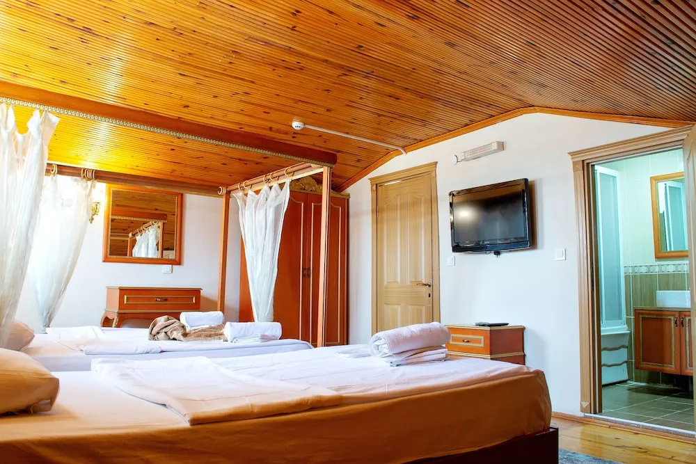 Deluxe Üç Kişilik Oda