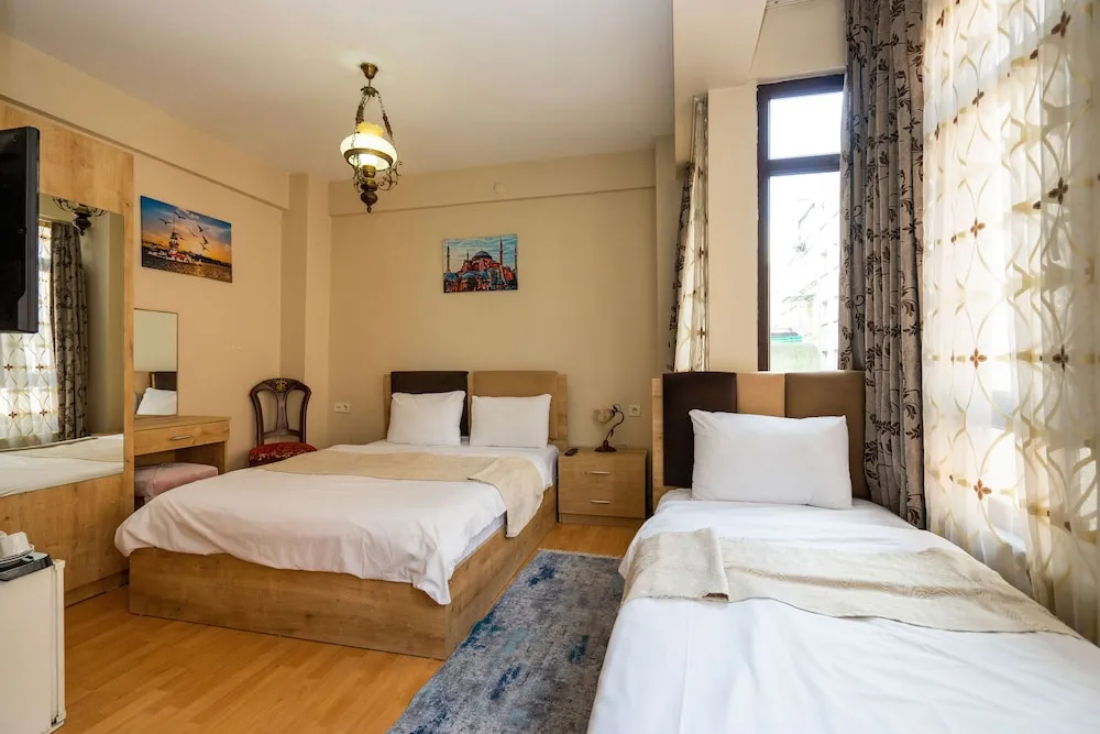 Deluxe Üç Kişilik Oda