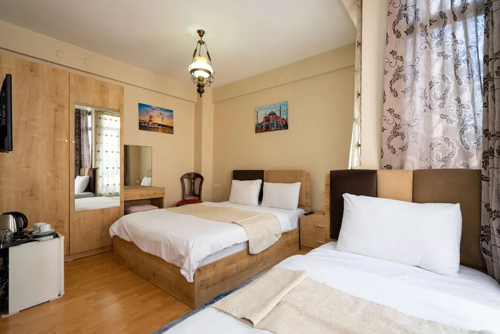 Deluxe Üç Kişilik Oda