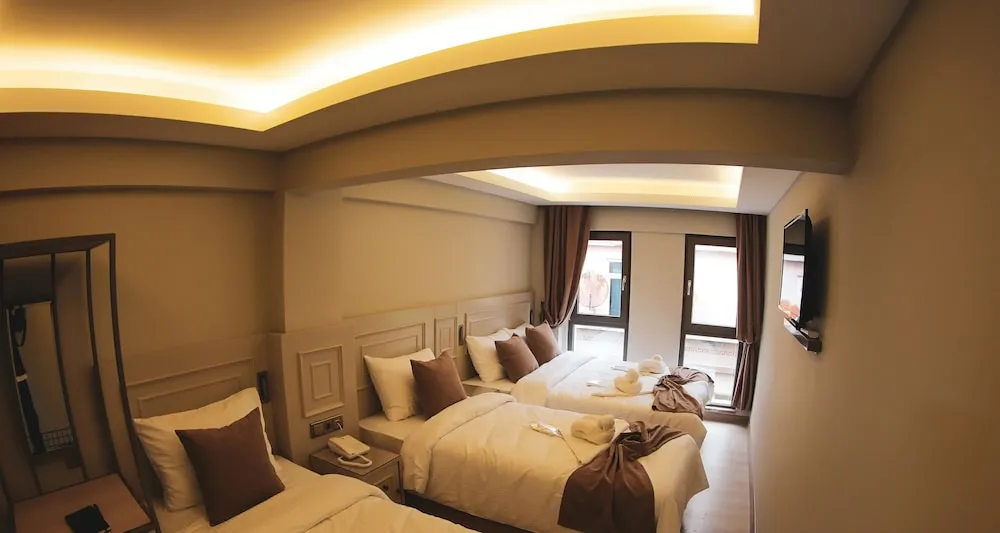 Deluxe Üç Kişilik Oda