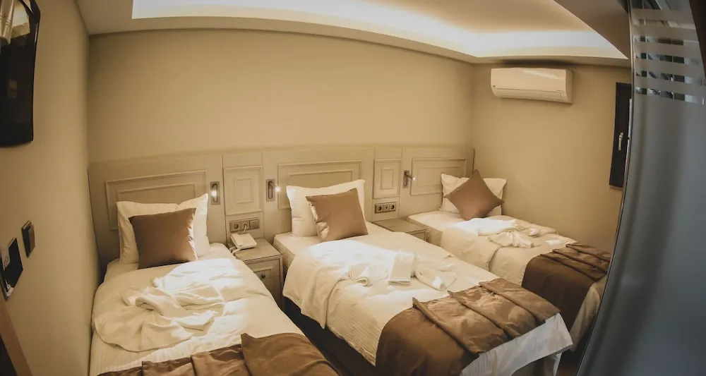 Deluxe Üç Kişilik Oda