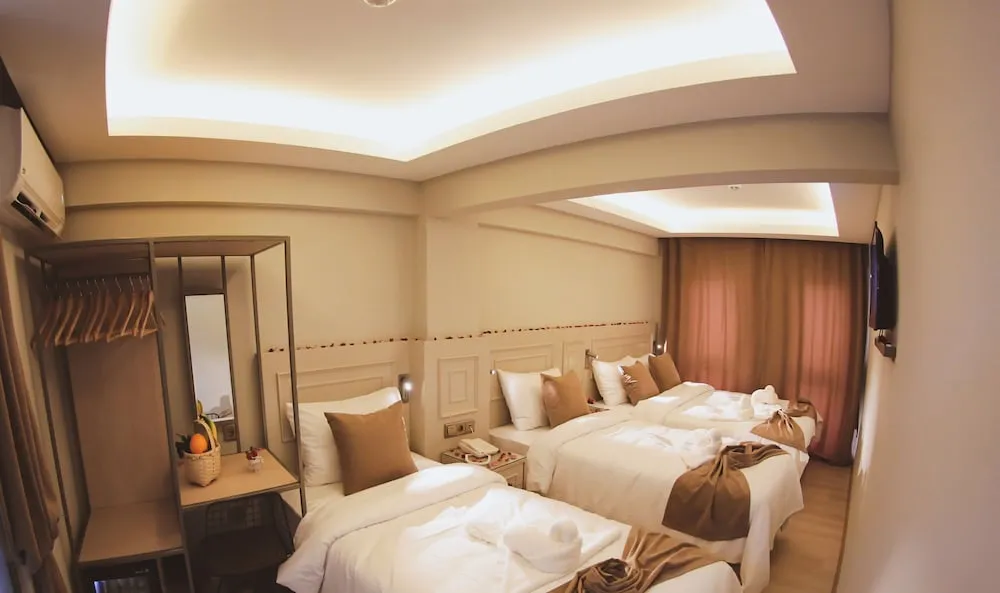 Deluxe Üç Kişilik Oda
