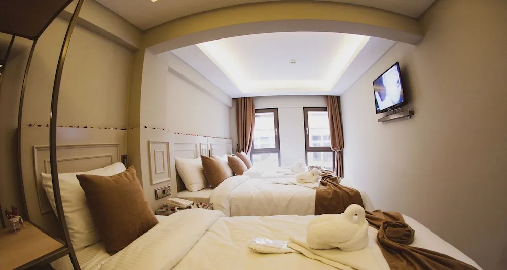 Deluxe Üç Kişilik Oda