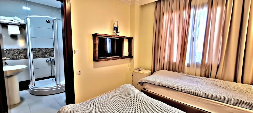 Economy Tek Büyük veya İki Ayrı Yataklı Oda