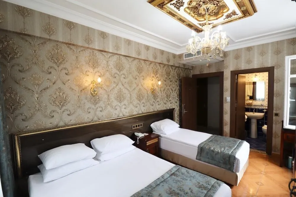 Deluxe Üç Kişilik Oda