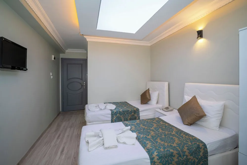 Standard Üç Kişilik Oda