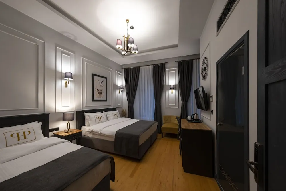 Deluxe Üç Kişilik Oda
