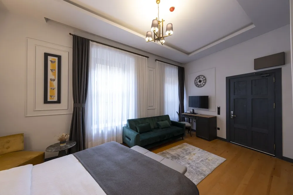 Deluxe Üç Kişilik Oda