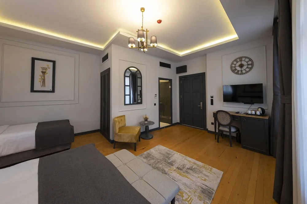 Deluxe Üç Kişilik Oda