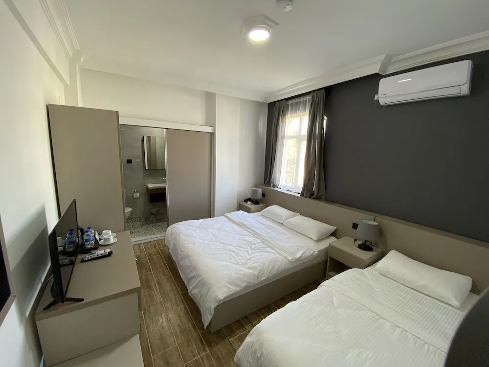 Deluxe Üç Kişilik Oda