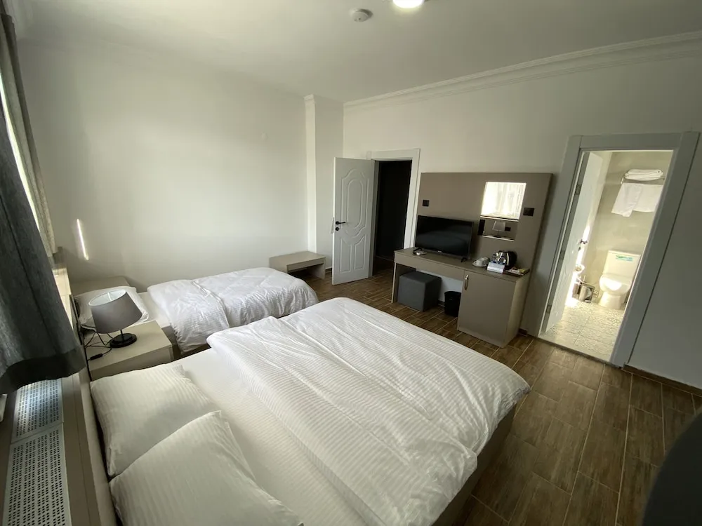 Deluxe Üç Kişilik Oda
