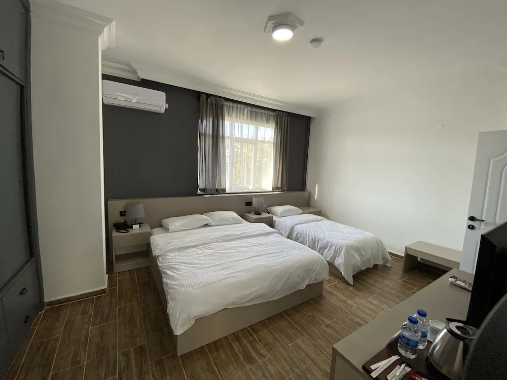 Deluxe Üç Kişilik Oda