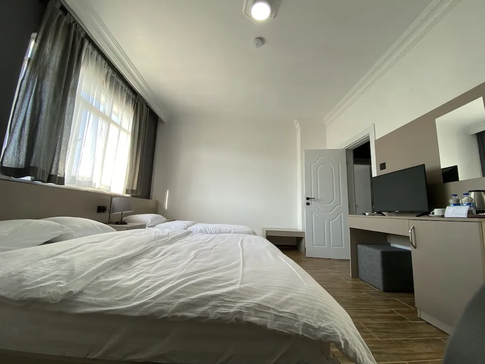 Deluxe Üç Kişilik Oda