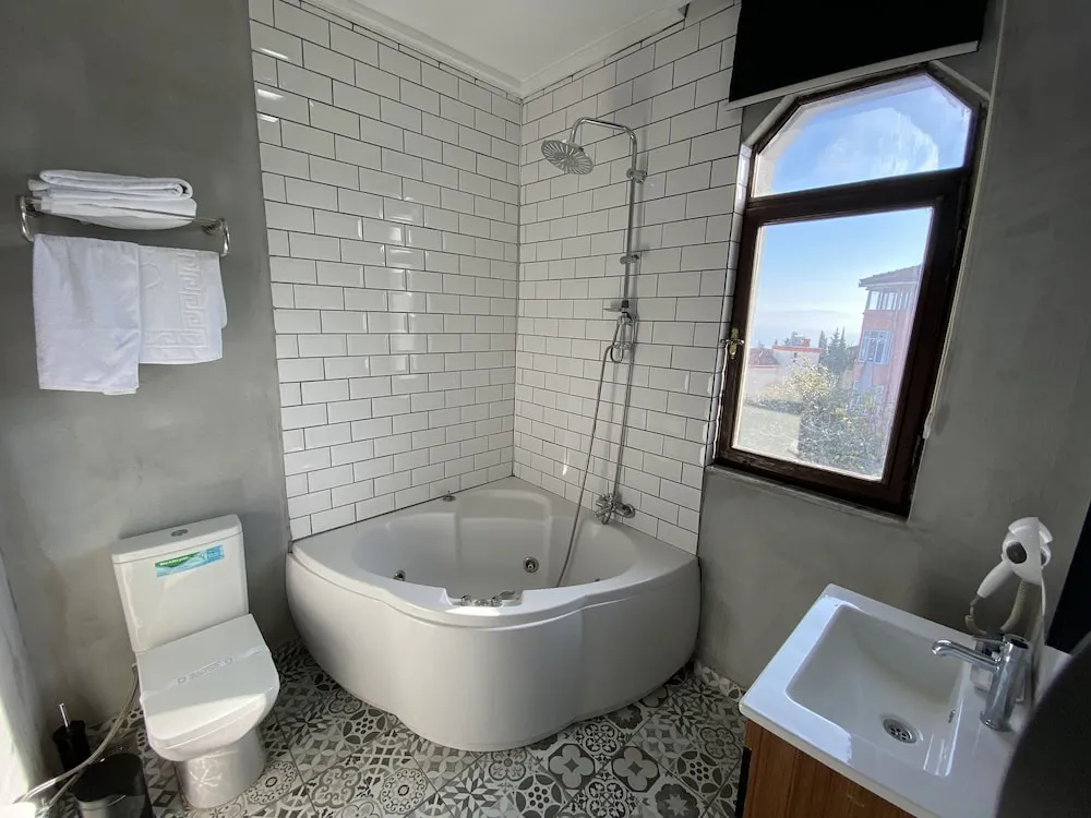 Deluxe Üç Kişilik Oda