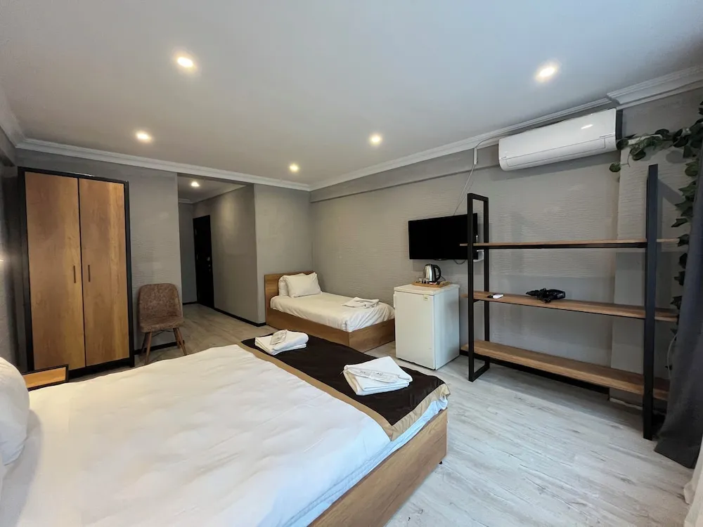 Deluxe Üç Kişilik Oda