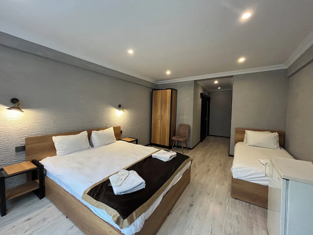 Deluxe Üç Kişilik Oda