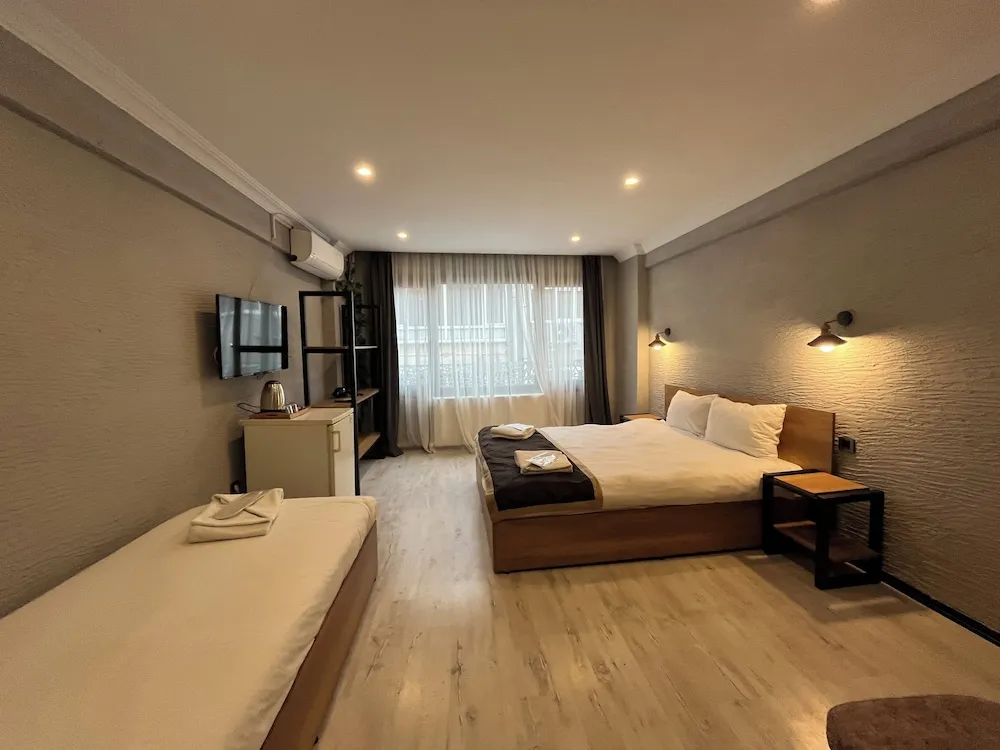 Deluxe Üç Kişilik Oda