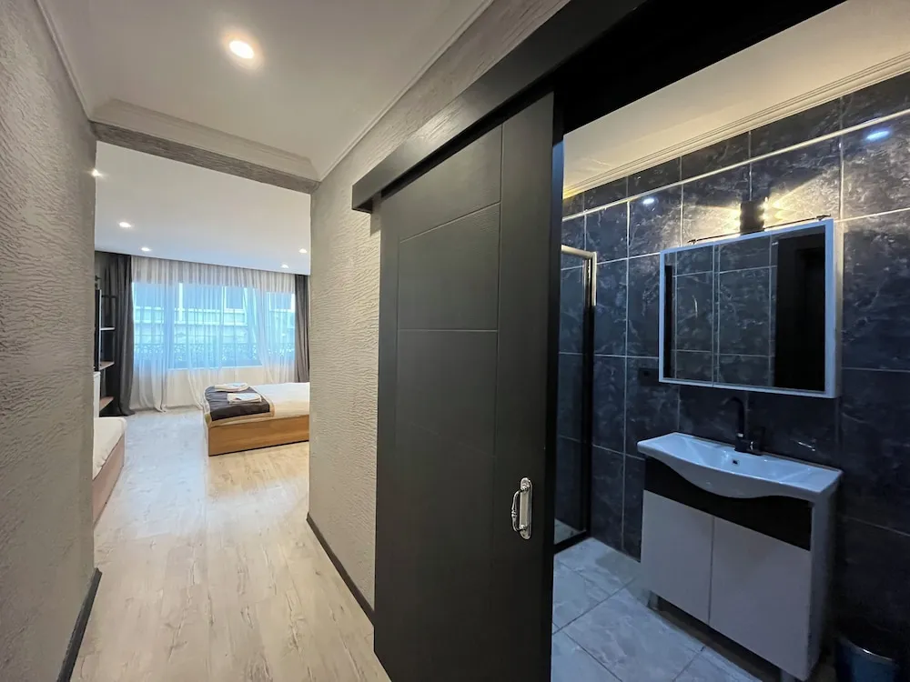 Deluxe Üç Kişilik Oda