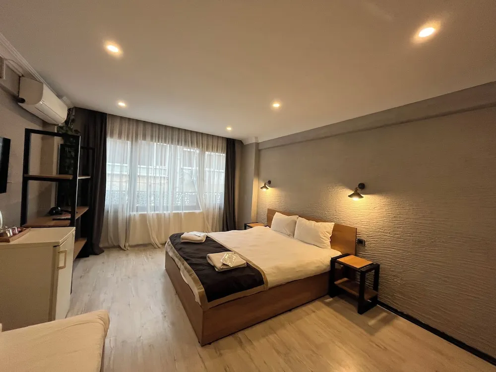 Deluxe Üç Kişilik Oda