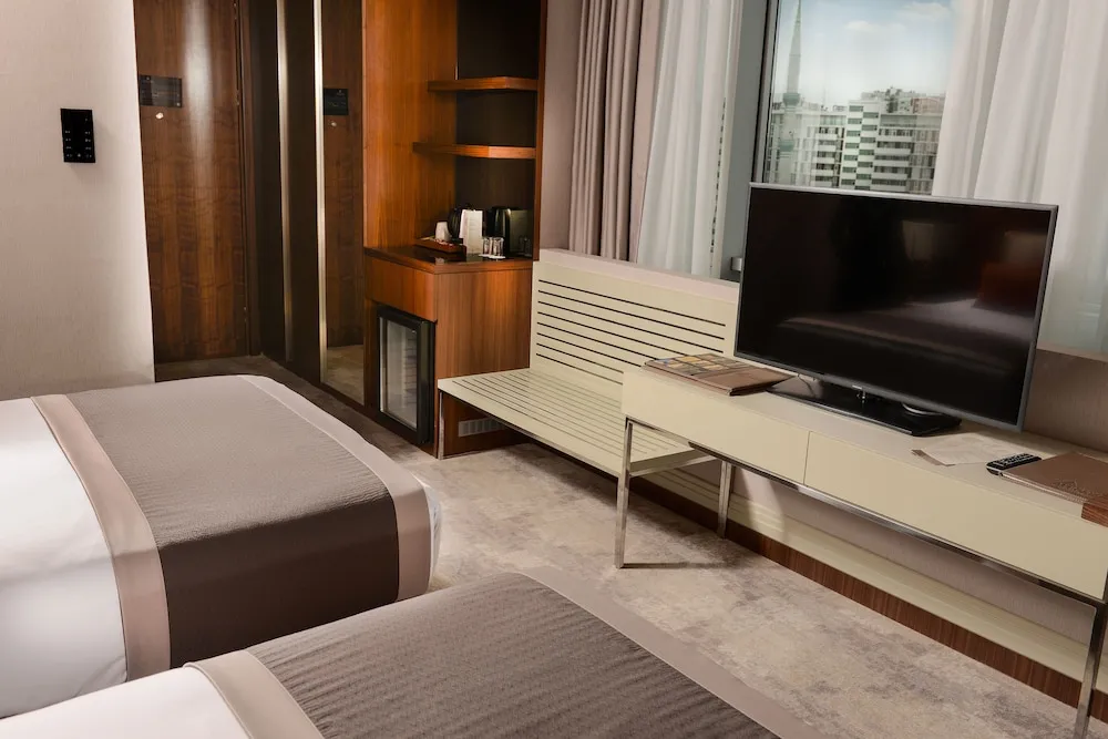 Deluxe Tek Büyük veya İki Ayrı Yataklı Oda