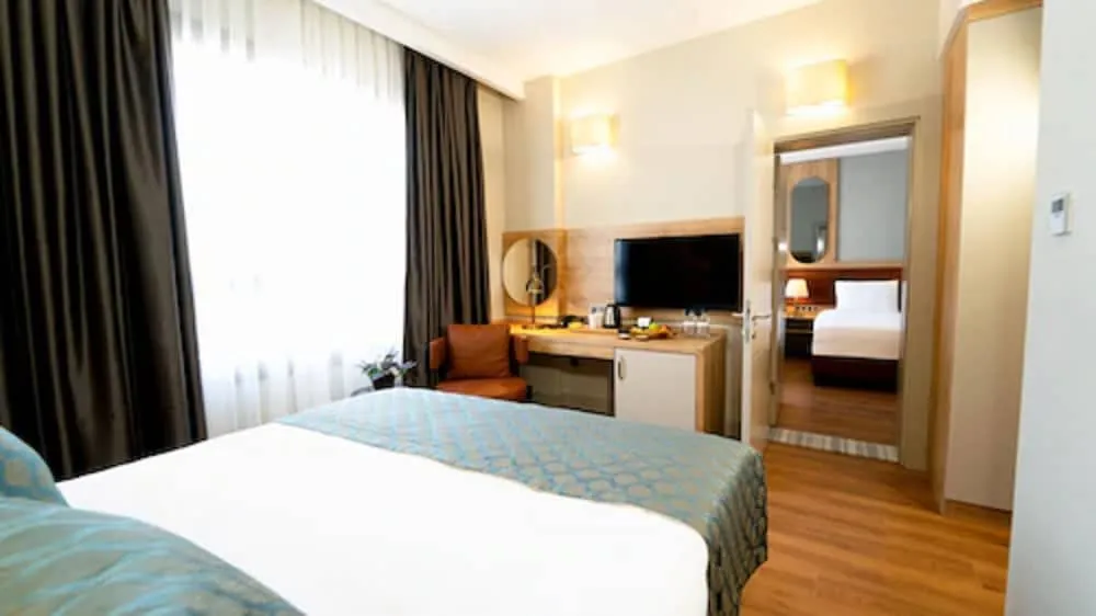 Deluxe Tek Büyük veya İki Ayrı Yataklı Oda