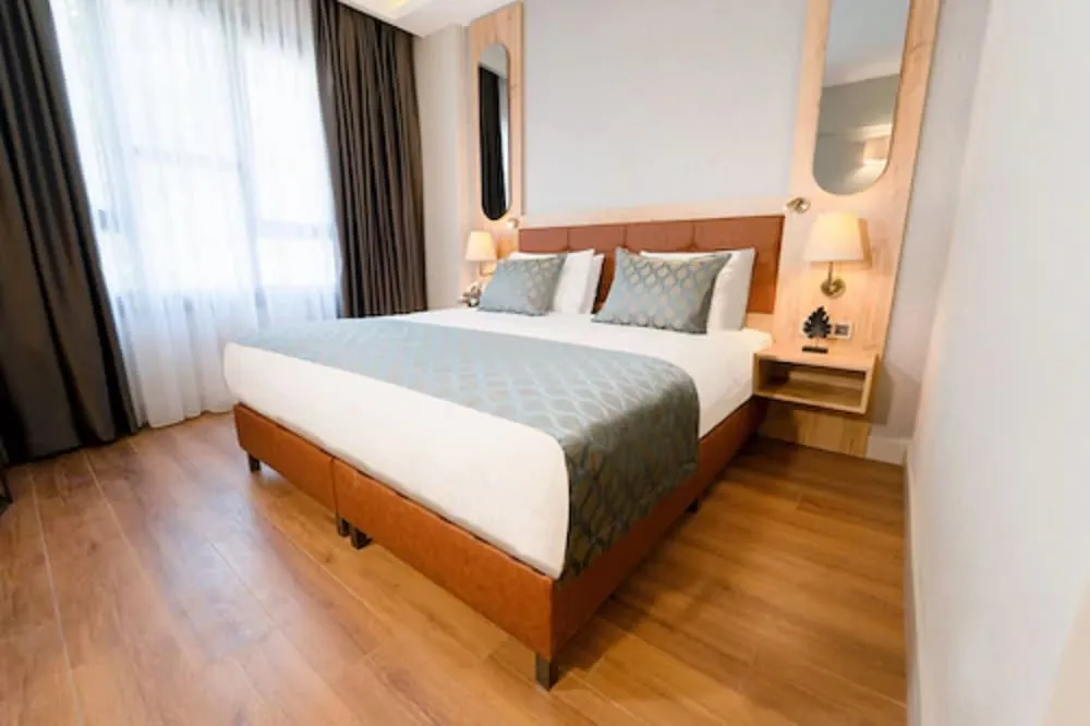 Deluxe Tek Büyük veya İki Ayrı Yataklı Oda