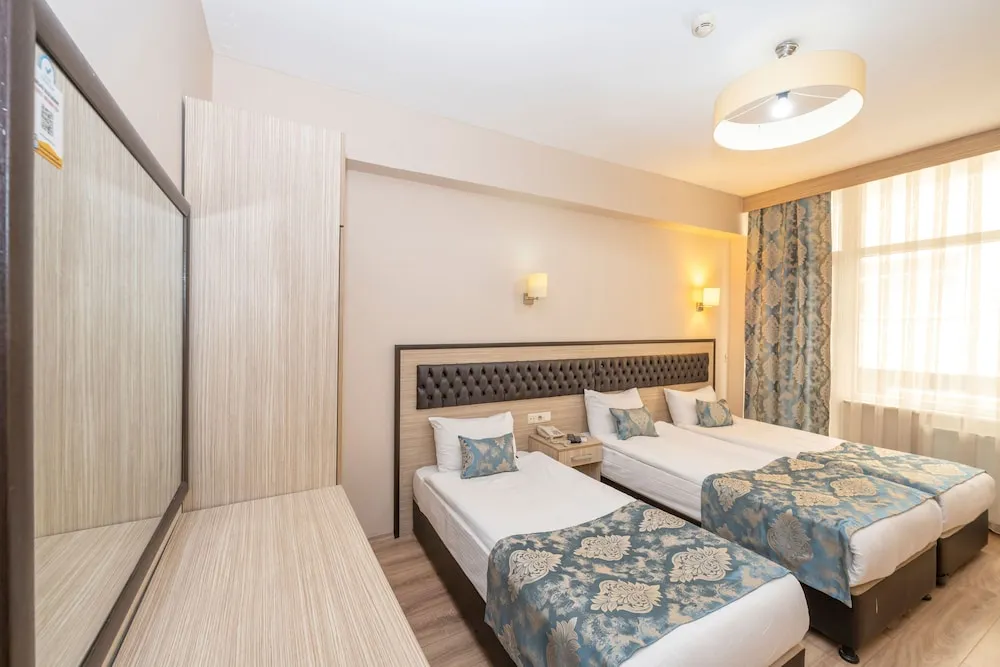 Deluxe Triple Room