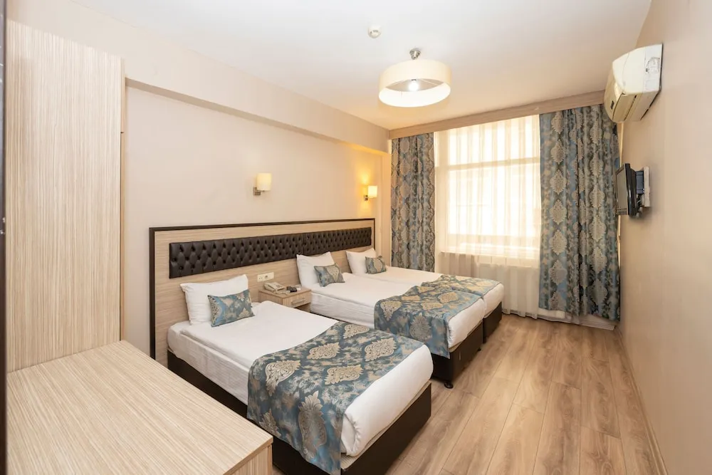 Deluxe Triple Room