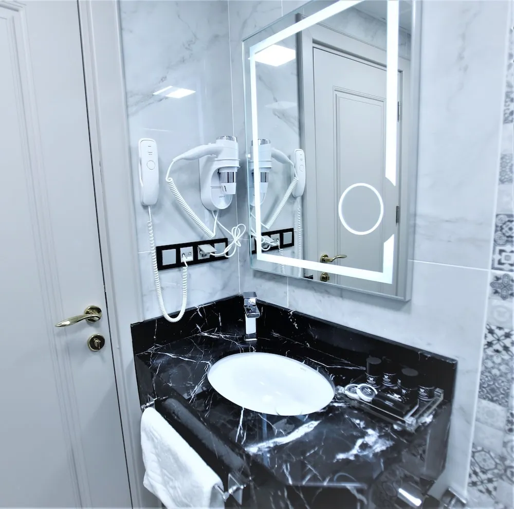 Deluxe Tek Büyük veya İki Ayrı Yataklı Oda