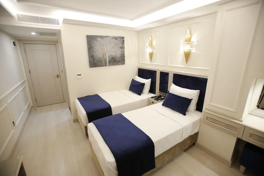 Deluxe Tek Büyük veya İki Ayrı Yataklı Oda