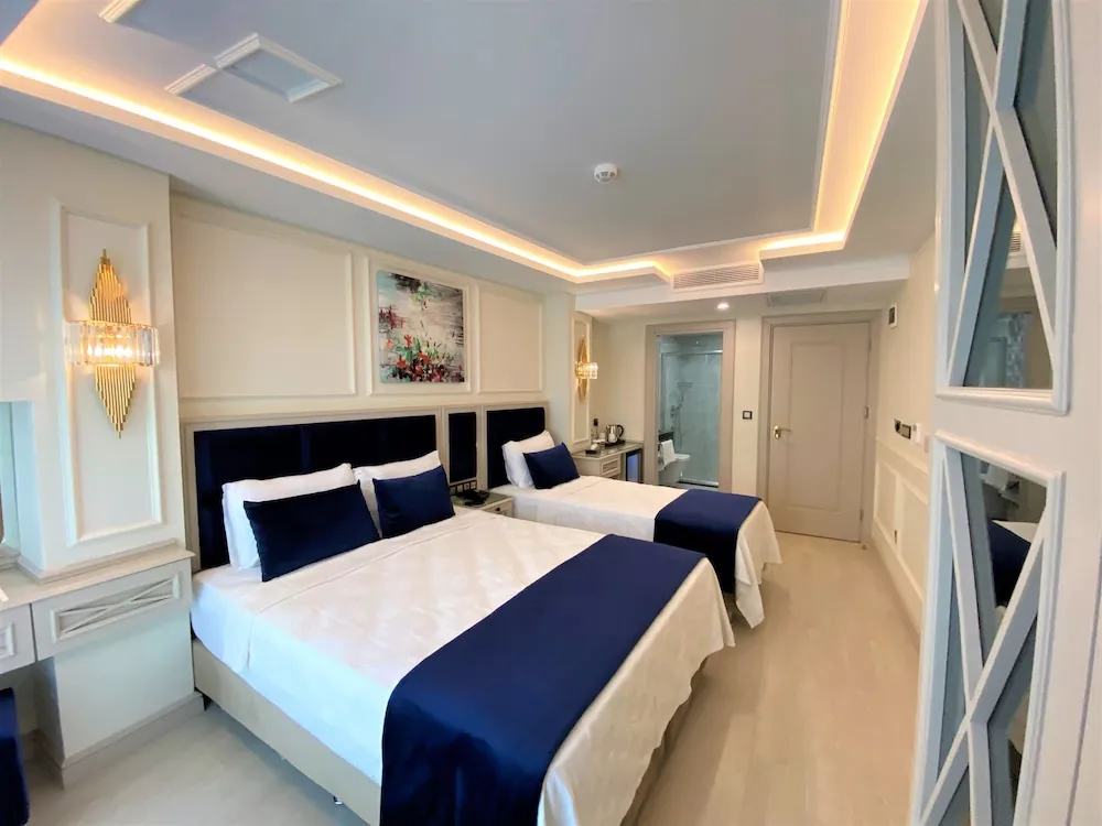 Deluxe Üç Kişilik Oda