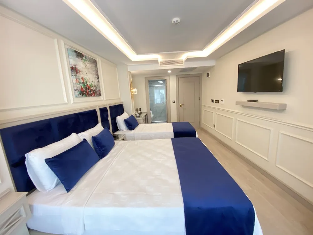 Deluxe Üç Kişilik Oda