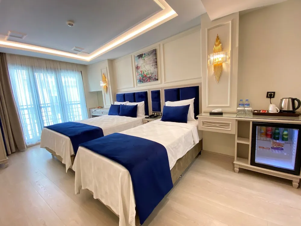 Deluxe Üç Kişilik Oda