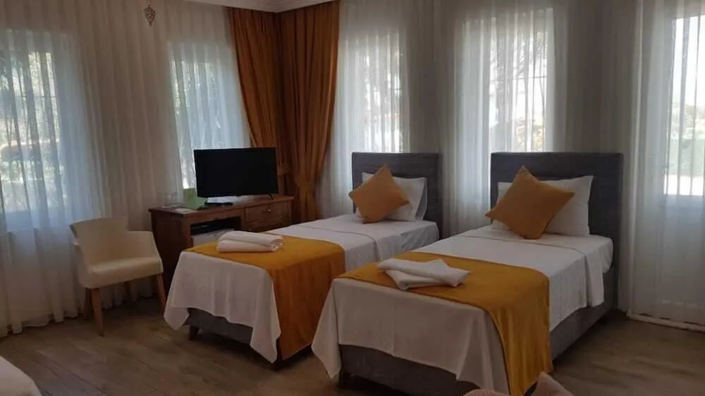 Deluxe Dört Kişilik Oda