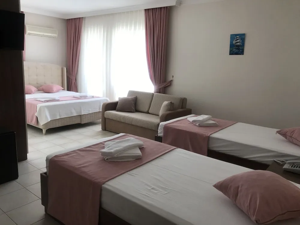 Deluxe Dört Kişilik Oda