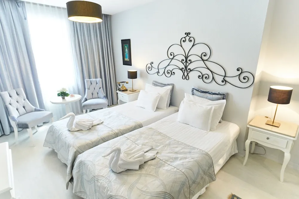 Deluxe Tek Büyük veya İki Ayrı Yataklı Oda