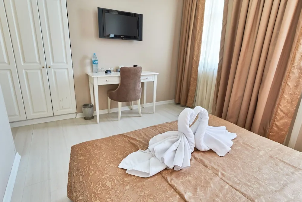 Deluxe Tek Büyük veya İki Ayrı Yataklı Oda