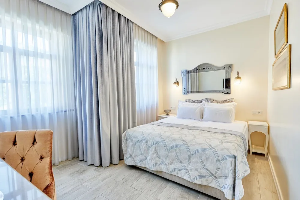 Deluxe Tek Büyük veya İki Ayrı Yataklı Oda