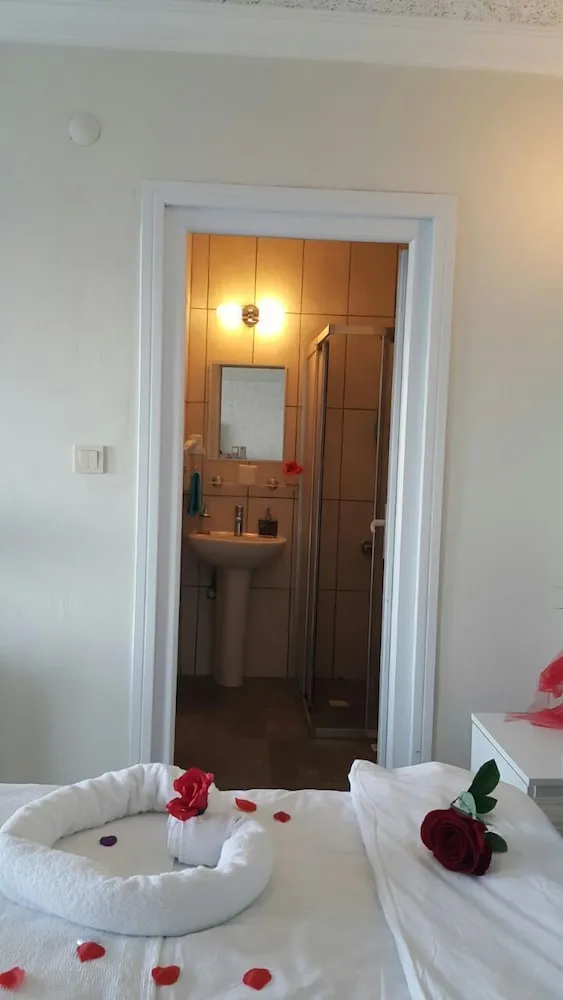 Üç Kişilik Oda