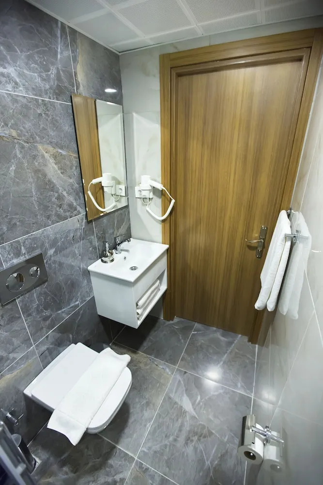 Deluxe Üç Kişilik Oda