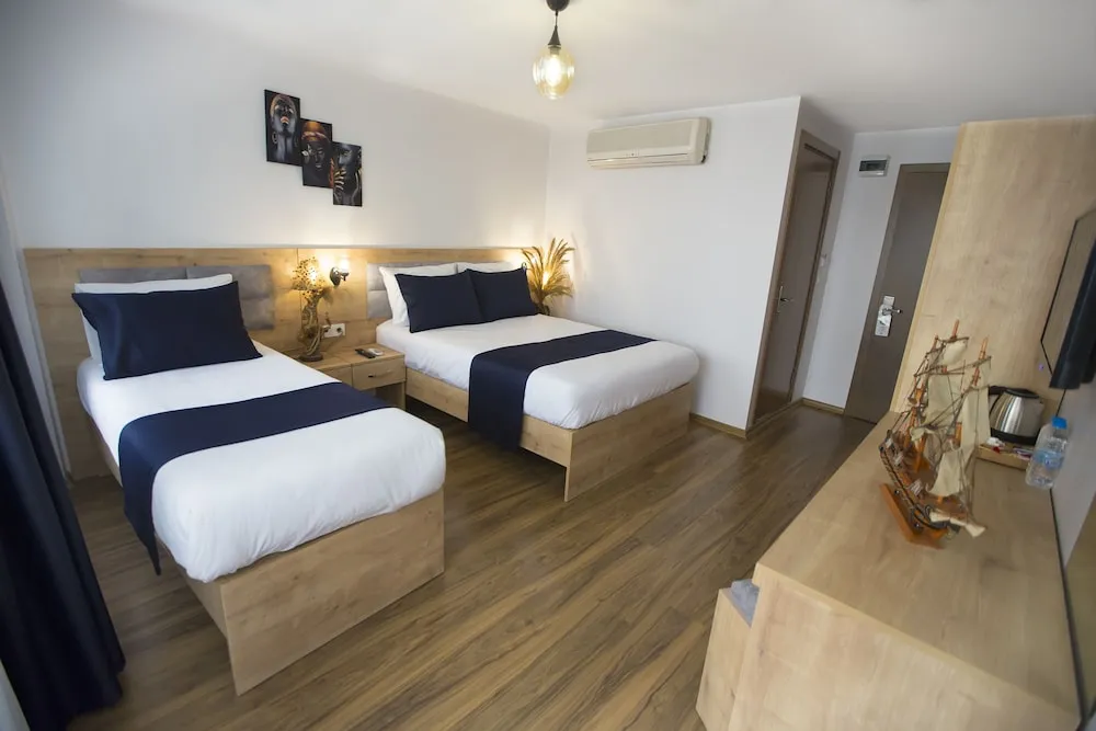 Deluxe Üç Kişilik Oda