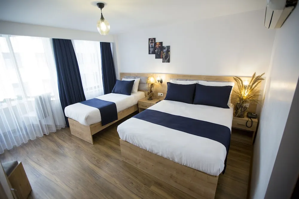 Deluxe Üç Kişilik Oda