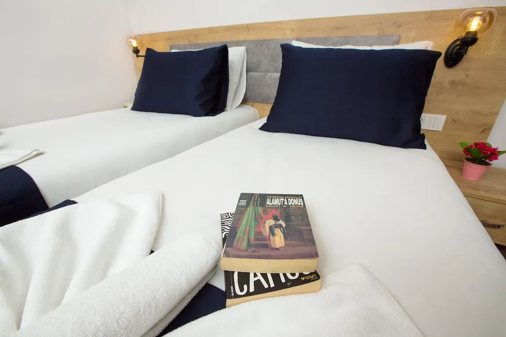 Deluxe Tek Büyük veya İki Ayrı Yataklı Oda