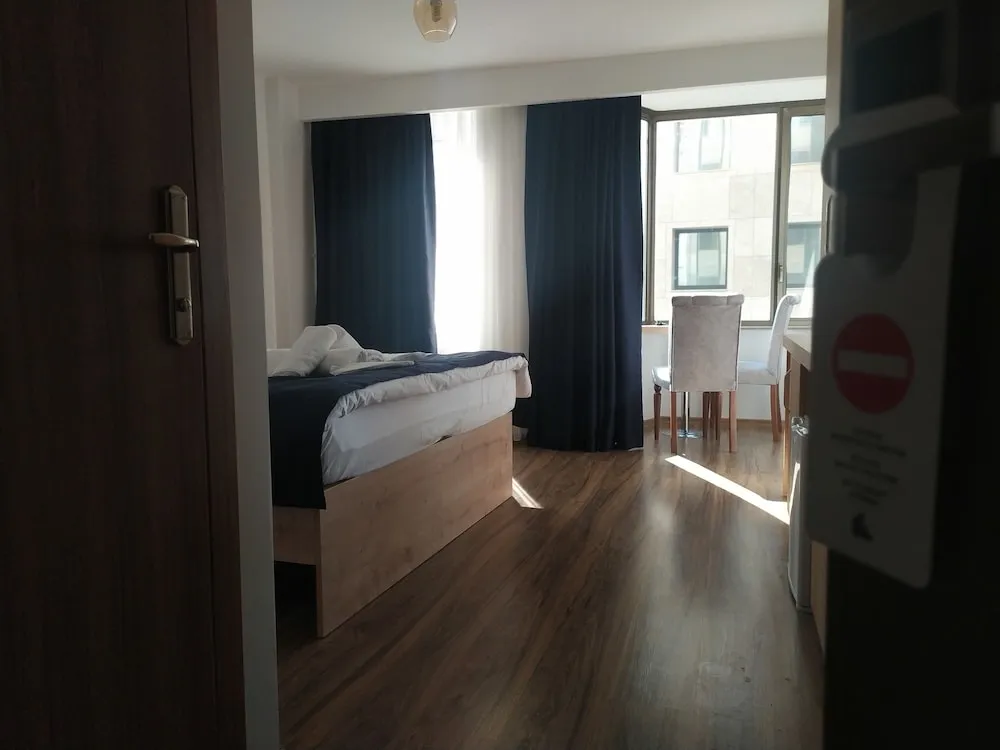 Deluxe Tek Büyük veya İki Ayrı Yataklı Oda