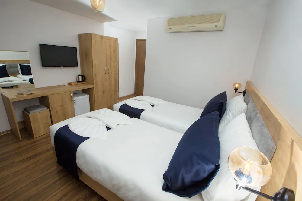 Deluxe Tek Büyük veya İki Ayrı Yataklı Oda