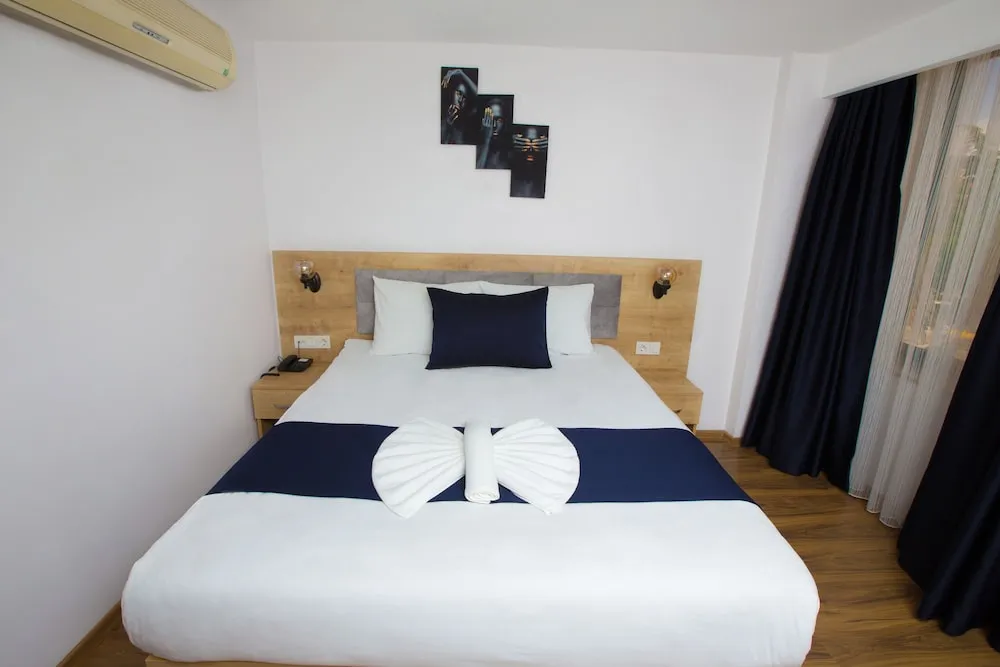 Deluxe Tek Büyük veya İki Ayrı Yataklı Oda