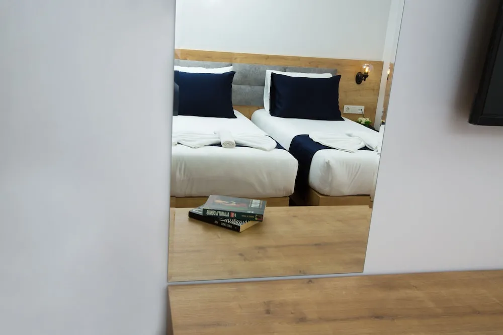 Economy Tek Büyük veya İki Ayrı Yataklı Oda